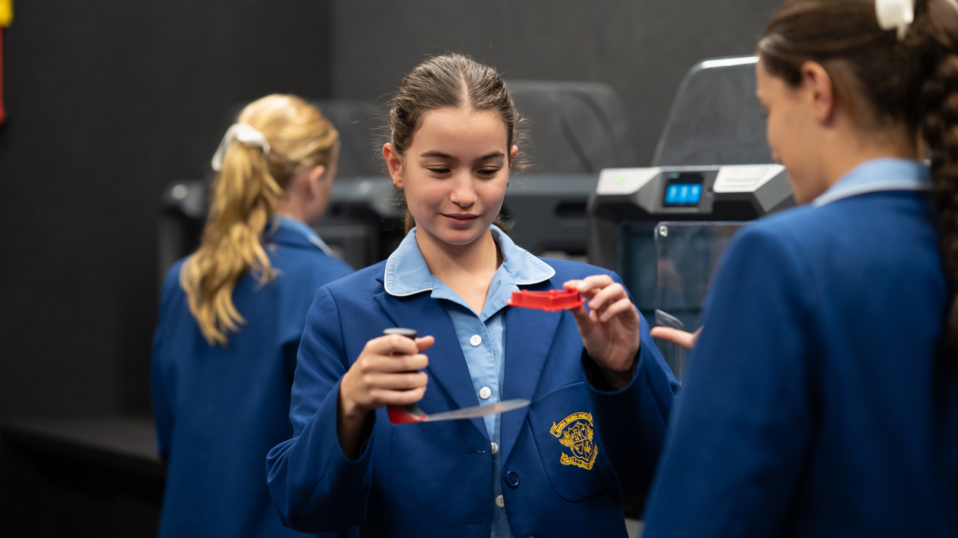 Student using 3D printer